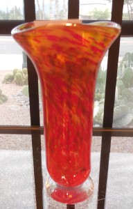 Doug Lorenz creates swirling furies of color in his blown glass vases.