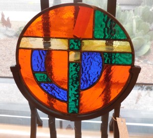 Sunset colors flood this stained glass suncatcher by Linda Birks