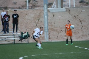 Bulldog Abbie Barnum #22 watches he shot head for goal Wednesday night during the Dawgs 5-0 win over the Mojave Rattlers. Barnum had four goals for her evenings work. Photo by Lou Martin