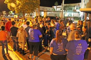 Many of Mesquite’s residents came together Tuesday night in front of City Hall to gather and hang yellow ribbons around Mesquite to honor Ethan Mendenhall, a ten-year-old boy who passed away from Stage IV Neuroblastoma on Monday night. Photo by Kris Zurbas.