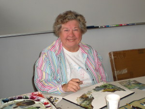 Joyce Burke with her watercolors. Photo by Susan Holladay.