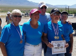 From left to right, Marty Lynch, Debbie Andrews, Coach Lance Barr, Sallie Henrie and Shirlie Kitzmiller feel ecstatic about their fellow club members winning medals at the 2015 Mesquite Senior Games Pistol Shoot.  Photo submitted.