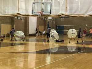 Students had a blast in the gym with their human-sized bubbles and volleyball courts. Photo by McQuade Chesley. 