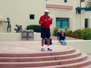 Milt Riley, Mesquite Tea Party affiliate, gave a reading of the Declaration of Independence in front of Mesquite City Hall on the morning of America’s 239th birthday, July 4, 2015 while Connie Foust, Mesquite Tea Party President, listened intently in the background. Photo by Teri Nehrenz.