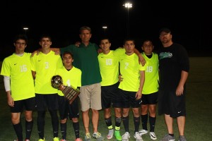 Bulldog seniors and coaches hoist Rivals Cup after a 7-0 win over Pirates 7-0. Featured from left to right, John Pollock, Emmanuel Navarro, David Cabrera with cup, head coach Mike Pletzke, Moises Medina, Jay Gomez, Orlando Diaz and assistant coach Sean FitzSimons. Photo by Lou Martin.