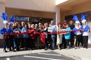 Mayor Al Litman, left center, and Barbara Ellestad, Mesquite Local News Editor, cut the ribbon on the MLN’s new office located at 12 W. Mesquite Blvd, Ste. 109. Photo submitted.