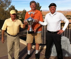 From left, Low Gross winner, Tim Miller is presented the President’s Cup by MMGA President Bubba Petrick with Low Net winner Bill Irace on the right. Submitted photo.