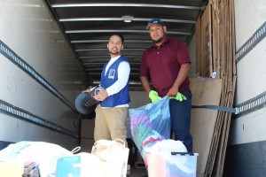 Aliah Jones and partner German Torres load the Goodwill truck in the Walmart parking lot with donations received from Mesquite residents on Tuesday, April 26 as part of the Southern Nevada Goodwill Community Challenge.  Photo by Teri Nehrenz