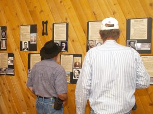 Family members view the history of their relatives who lived in Silver Reef during the heyday of mining. Photo by Burton Weast.