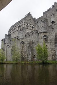 The Gravensteen Castle seen on the bank of the Leie River was built in 1180.  