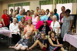 :  Mesquite Toes Tap Team members and supporters gather around the ‘Queen of the Dance’ during Vicki Eckman’s retirement party at the Mesquite Lutheran Church on May 19.  Photo by Teri Nehrenz