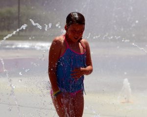 :  Myla Walch visits the Hafen Park splash pad on June 2 all the way from Alamo, NV to cool off and let off some steam before visiting the dentist.  Photo by Teri Nehrenz  