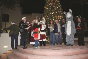 The members of Peaceful Valley Donkey Rescue stuck around until the very end to make sure they could take their trophy home with them for the First Annual Light Parade. Photo by Stephanie Clark.