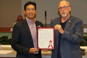 Greg Lee, left, receives a proclamation from Mesquite Mayor Al Litman naming Nov. 16 as Ted and Doris Lee Day in honor of his parents who began the Eureka Casino Hotel Resort. Photo by Barbara Ellestad. 