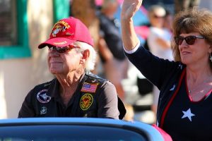 The 2016 Mesquite Veteran’s Day Parade Grand Marshall, Retired Marine Corp. Captain T.J. Richardson and his escort. Photo by Teri Nehrenz